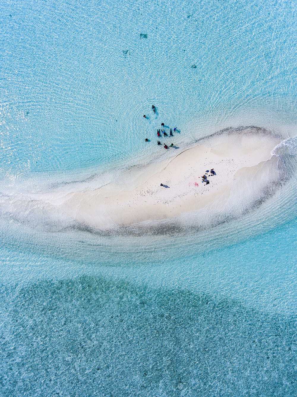 Aerial view of people on a sandbank near Guraidhoo, Maldives